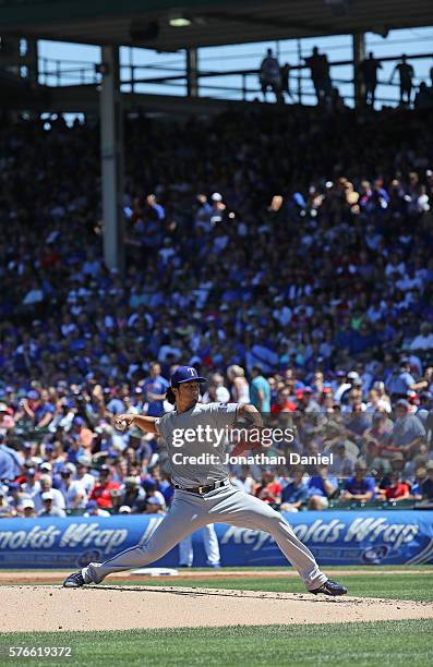 Starting pitcher Yu Darvish of the Texas Rangers delivers the ball against the Chicago Cubs at Wrigley Field on July 16, 2016 in Chicago, Illinois.