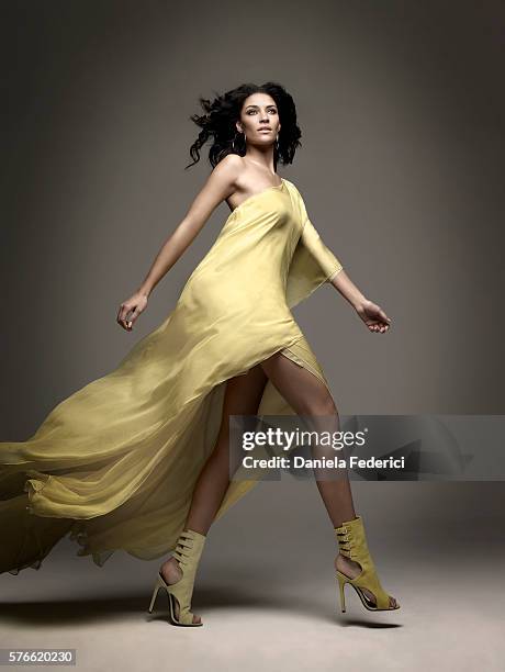 Styling by Garth Condit, makeup by Lisa Garner and hair by Charles Baker Strahan. One-shoulder chiffon dress in lemon and Cluny three-quarter boot in...