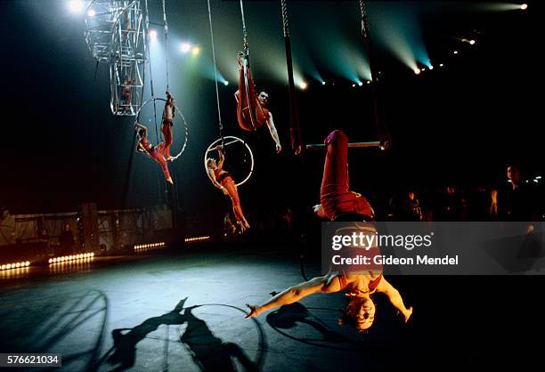 acrobats for millennium show - circus performer stock pictures, royalty-free photos & images