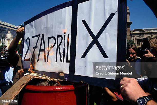 south african protesters burning sign on election day - apartheid stock pictures, royalty-free photos & images