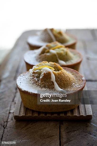 lemon and pistachio financiers - lemon cake stock pictures, royalty-free photos & images