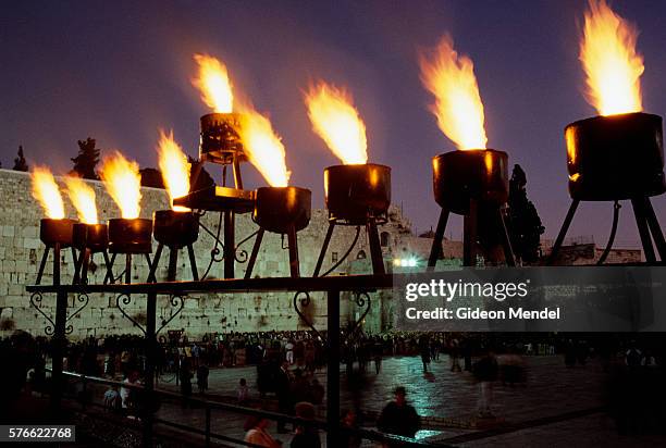 flaming menorah at western wall - hanukkah stock pictures, royalty-free photos & images