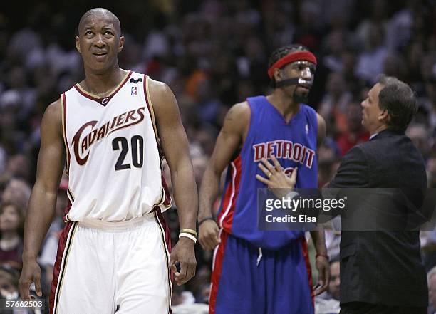 Eric Snow of the Cleveland Cavaliers reacts after he is called for a foul as Richard Hamilton and head coach Flip Saunders of the Detroit Pistons...