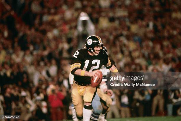 Pittsburgh Steeler quarterback Terry Bradshaw sprints out to pass against the Dallas Cowboys in the 1978 Super Bowl at Miami's Orange Bowl.