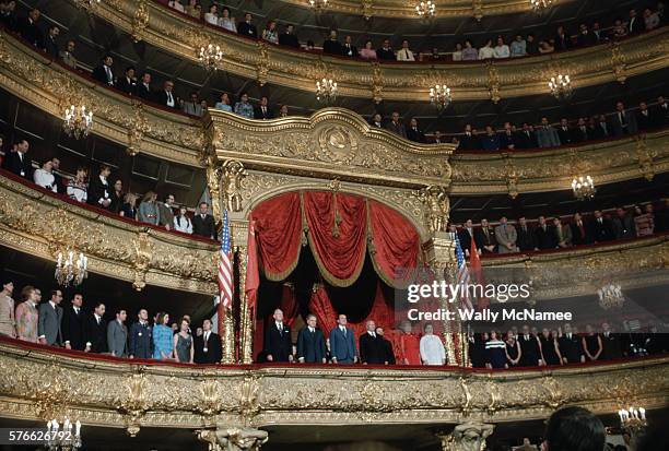 President Richard Nixon, his wife Pat, Secretary of State William Rogers and Soviet officials Nicolai Podgorny and Aleksei Kosygin stand in the VIP...