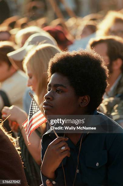 Antiwar Protester Holding a Flag