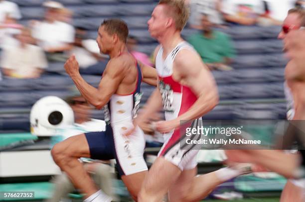 Frank Buseman and Dan O'Brien race to finish the 100 meter run during the decathlon at the 1996 Olympics. O'Brien won the gold medal and Busemann won...