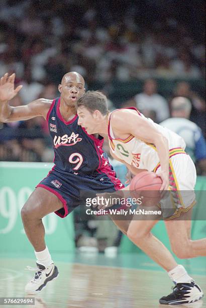 Mitch Richmond of the USA guards Lithuanian player Arturas Karnisovas during the 1996 Atlanta Olympic Games. The US would win the game 104-82.
