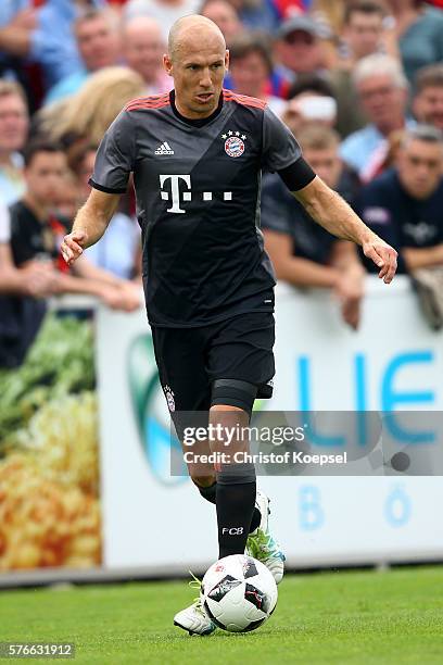 Arjen Robben of Bayern Muenchen runs with the ball during the friendly match between SV Lippstadt and FC Bayern at Stadion am Bruchbaum on July 16,...