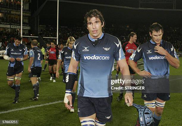 Christchurch, NEW ZEALAND: Victor Matfield captain of the Bulls along with teammates leave the field after the Super 14 semi-final match against the...