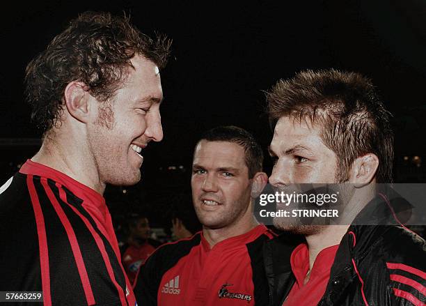 Christchurch, NEW ZEALAND: Chris Jack, Reuben Thorne and captain Ritchie McCaw of the Crusaders celebrate their win against the Bulls in the Super 14...
