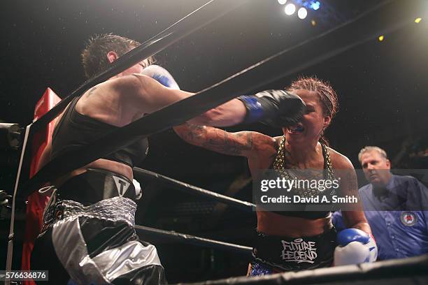 Layla McCarter and Melissa Hernandez exchange punches during their match at Legacy Arena at the BJCC on July 16, 2016 in Birmingham, Alabama.