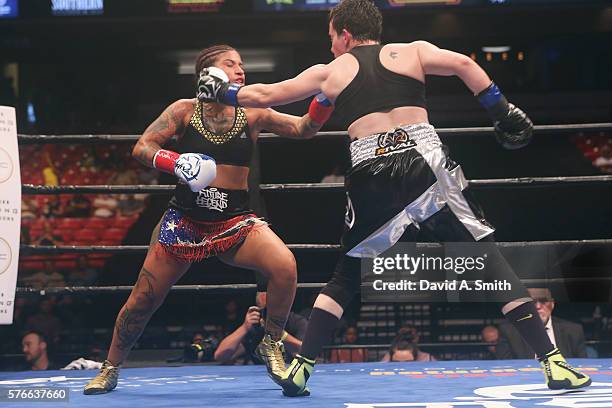 Melissa Hernandez and Layla McCarter exchange punches during their match at Legacy Arena at the BJCC on July 16, 2016 in Birmingham, Alabama.