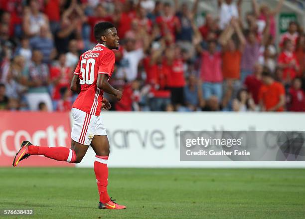 Benfica's defender Nelson Semedo celebrates after scoring a goal during the Algarve Football Cup Pre Season Friendly match between SL Benfica and...