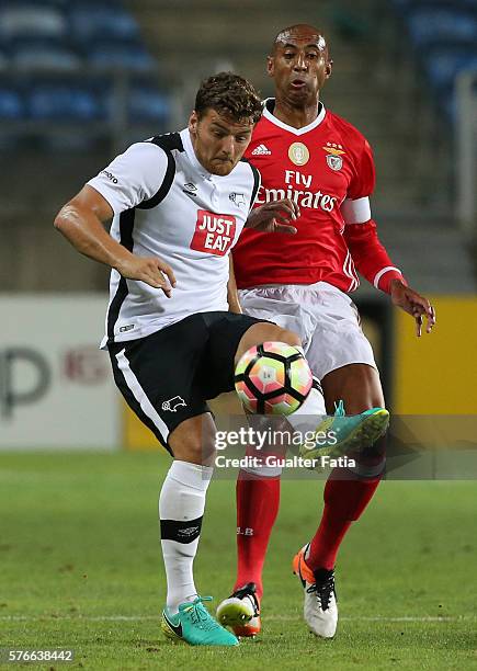 Derby County's forward Russel with SL Benfica's defender from Brazil Luisao in action during the Algarve Football Cup Pre Season Friendly match...