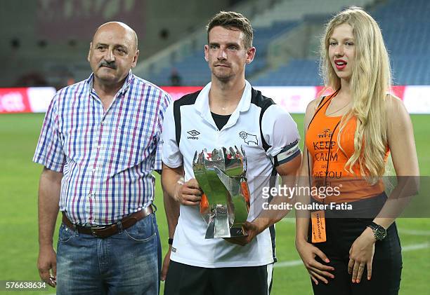 Derby County FC's midfielder Bryson receives the 3rd place trophy at the end of the Algarve Football Cup Pre Season Friendly match between SL Benfica...