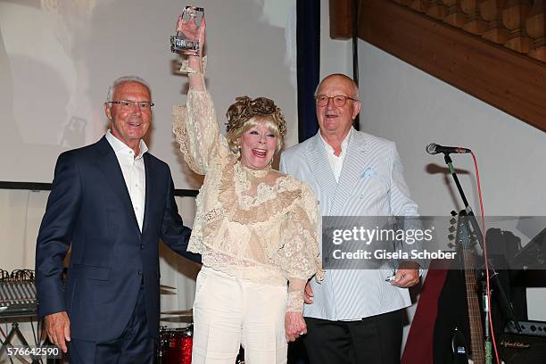 Franz Beckenbauer , Elke Sommer with award and Alois Hartl during the Kaiser Cup 2016 gala on July 16, 2016 in Bad Griesbach near Passau, Germany.