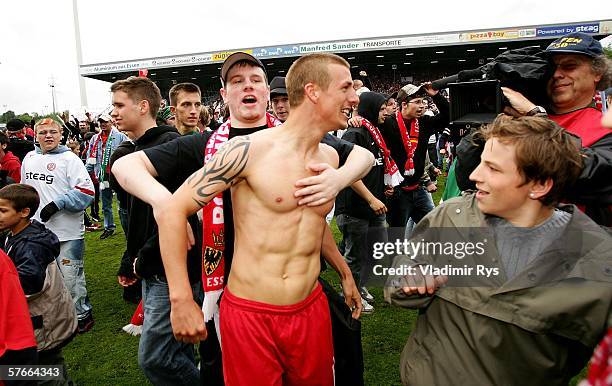 Florian Thorwart of Essen celebrates with the fans after the final whistle of the Third League match between Rot Weiss Essen and Werder Bremen II at...