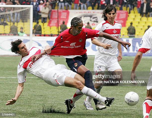 Moscow, RUSSIAN FEDERATION: Moscow's CSKA Brazilian striker Jo vies with Martin Stranze of Spartak Moscow in the Russian Cup final match between CSKA...