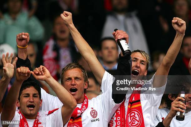 Ferhat Kiskanc, Ronny Nikol, Andre Maczkowiak and Stijn Haeldermans of Essen celebrate after the end of the Third League match between Rot Weiss...