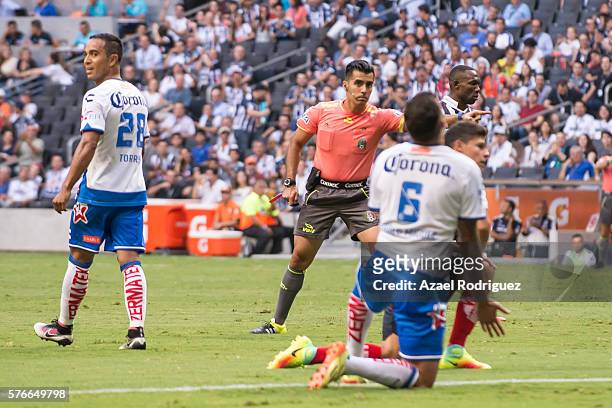 Referee Adonai Escobedo marks a penalty during the 1st round match between Monterrey and Puebla as part of the Torneo Apertura 2016 Liga MX at BBVA...