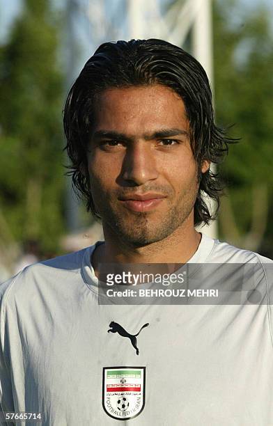 Iran's national football player, Amir Hossein Sadeghi, is seen during a trainning session prior to the 2006 World Cup at a camp in Tehran, 20 May...