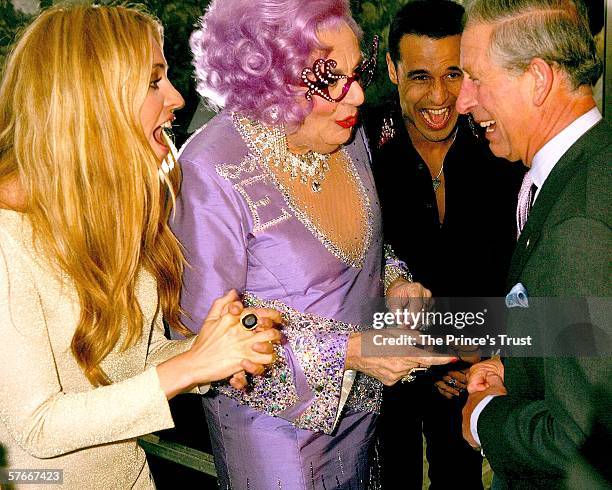 Prince Charles, Prince of Wales meets Cat Deeley, Dame Edna Everedge and Chico Slimani in the artist's backstage Green Room during The Prince's Trust...