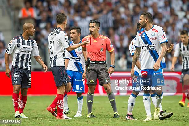 Players of Monterrey argue with referee Adonai Escobedo during the 1st round match between Monterrey and Puebla as part of the Torneo Apertura 2016...