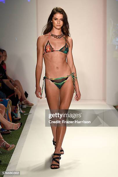 Model walks the runway at Sirenes De Soleil 2017 Collection at SwimMiami at W South Beach on July 16, 2016 in Miami Beach, Florida.