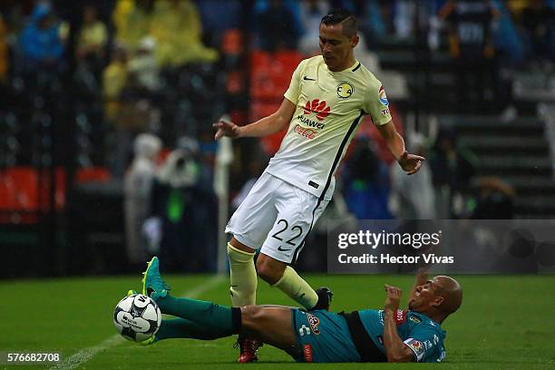 Paul Aguilar of America struggles for the ball with Egidio Arevalo of Chiapas during the 1st round match between America and Chiapas as part of the...