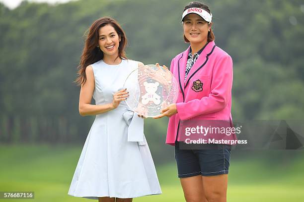 Anne Nakamura of Japan and Mi-Jeong Jeon of South Korea pose during award ceremony for the Samantha Thavasa Girls Collection Ladies Tournament 2016...