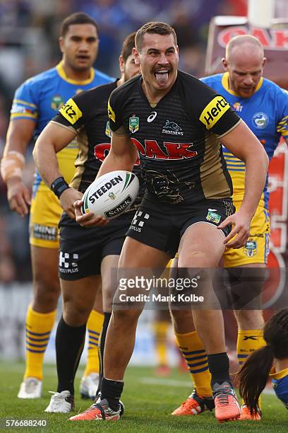 Reagan Campbell-Gillard of the Panthers celebrates scoring a try during the round 19 NRL match between the Penrith Panthers and the Parramatta Eels...
