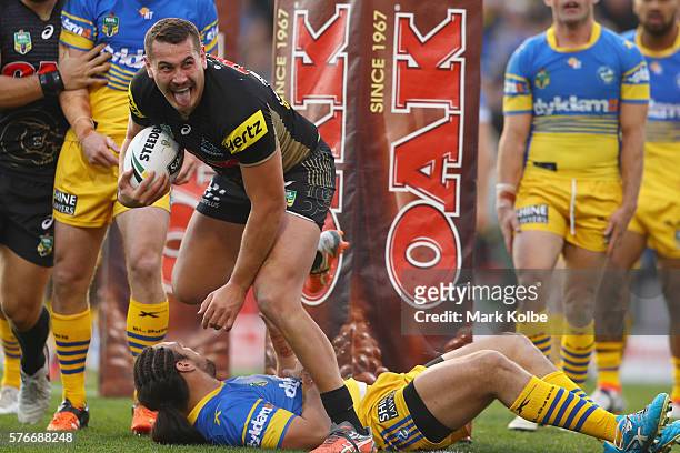 Reagan Campbell-Gillard of the Panthers celebrates scoring a try during the round 19 NRL match between the Penrith Panthers and the Parramatta Eels...