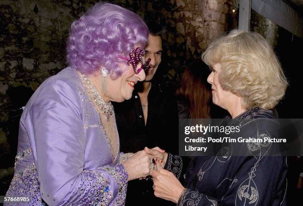 Camilla Duchess of Cornwall meets Barry Humphries as Dame Edna Everage, at the live pop concert to mark the 30th Anniversary of the Prince's Trust...