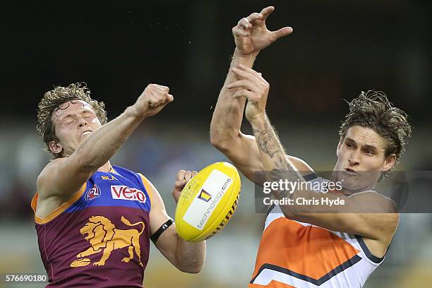 Ryan Lester of the Lions spoils a mark from Rory Lobb of the Giants during the round 17 AFL match between the Brisbane Broncos and the Greater...