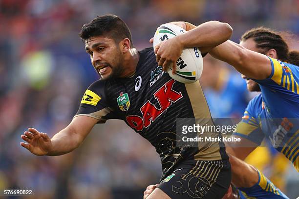 Tyrone Peachey of the Panthers is tackled during the round 19 NRL match between the Penrith Panthers and the Parramatta Eels at Pepper Stadium on...