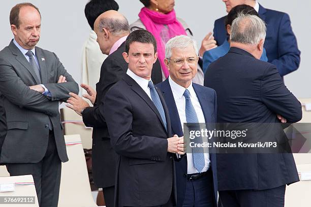French Prime Minister Manuel Valls and the President of the National Assembly Claude Bartolone attend the Bastille Day s Military Parade on the...