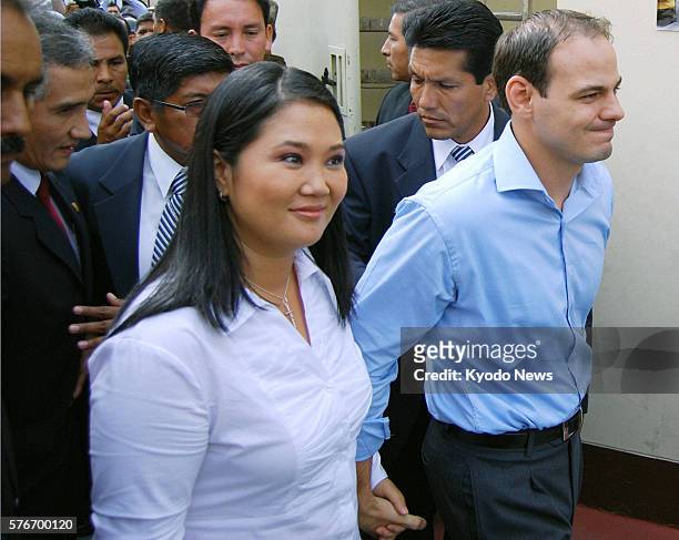 Peru - Peruvian presidential candidate Keiko Fujimori visits a polling station in Lima with her husband on April 10, 2011. Fujimori is the eldest...