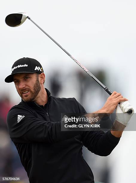 Golfer Dustin Johnson watches his drive from the 6th tee during his final round on day four of the 2016 British Open Golf Championship at Royal Troon...
