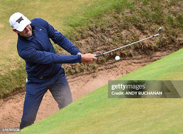 South Africa's Charl Schwartzel plays from a green-side bunker on the 8th hole during his final round on day four of the 2016 British Open Golf...