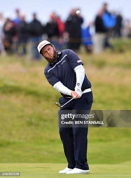 England's Andrew Johnston chips onto the 4th green during his final round on day four of the 2016 British Open Golf Championship at Royal Troon in...