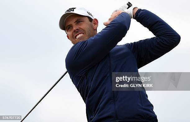 South Africa's Charl Schwartzel watches his drive from the 6th tee during his final round on day four of the 2016 British Open Golf Championship at...