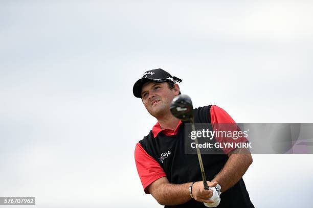 Golfer Patrick Reed watches his drive from the 6th tee during his final round on day four of the 2016 British Open Golf Championship at Royal Troon...