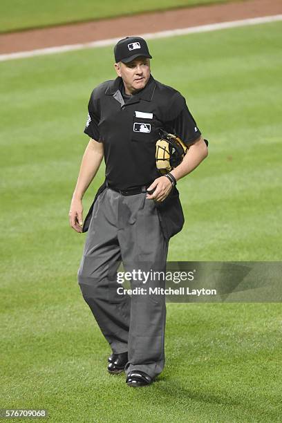 Umpire Paul Emmel looks on during a baseball game between the Baltimore Orioles and the Los Angeles Angels of Anaheim at Oriole Park at Camden Yards...