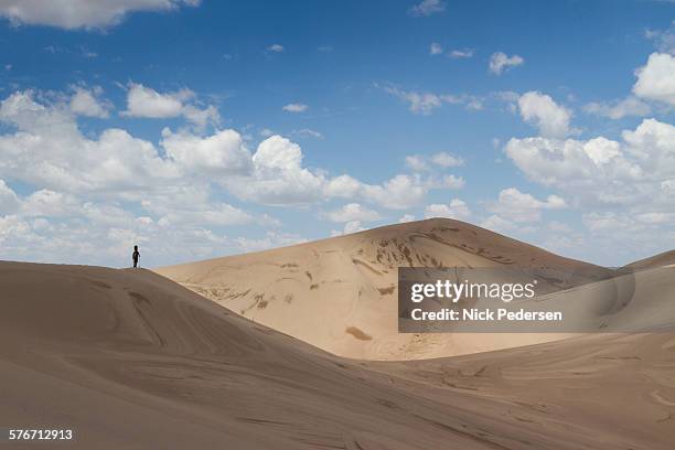 hiking the great sand dunes - great sand dunes national park stock pictures, royalty-free photos & images