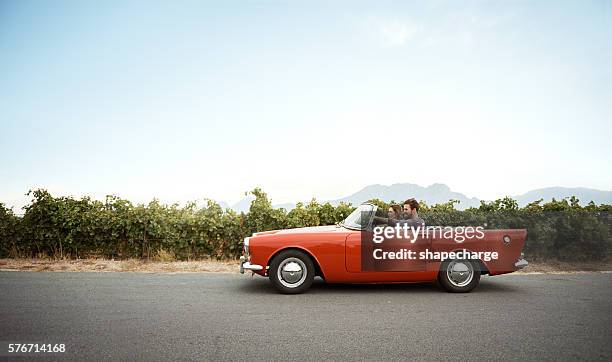 pack the car, the road awaits - convertible imagens e fotografias de stock