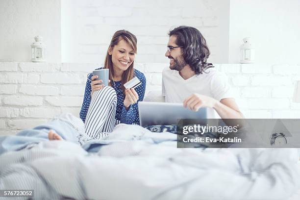 young couple at home - hipster coffee shop candid stock pictures, royalty-free photos & images