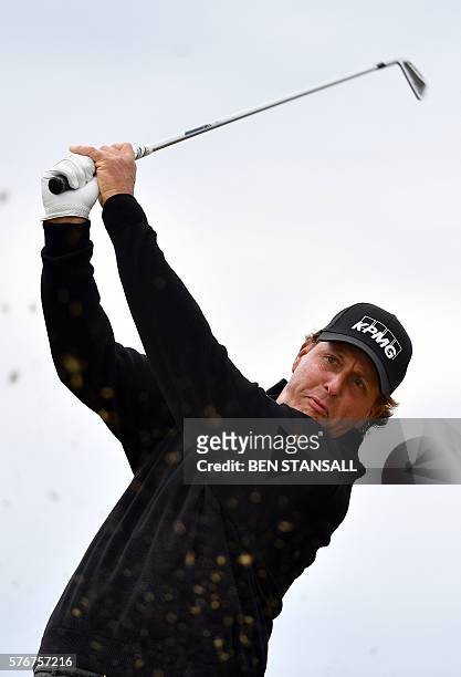 Golfer Phil Mickelson watches his shot from the 6th tee during his final round on day four of the 2016 British Open Golf Championship at Royal Troon...