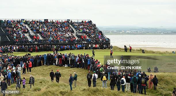 Sweden's Henrik Stenson putting on the 5th green during his final round on day four of the 2016 British Open Golf Championship at Royal Troon in...