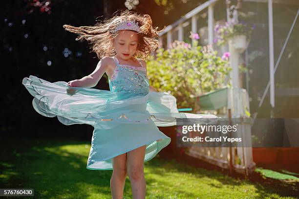 girl ( 5) dancing in field in princess dress - princess stock pictures, royalty-free photos & images